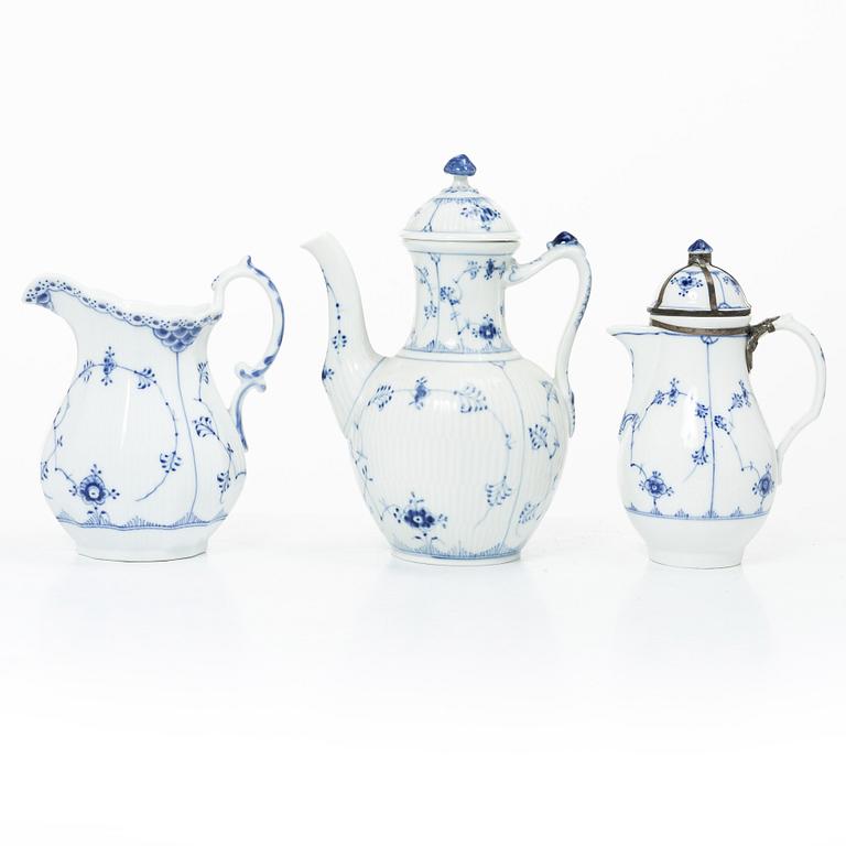 Royal Copenhagen, Lot of porcelain, 7 pieces, “Musselmalet”, coffee pot, chocolate pot, water jug, sauce boat, 3 cream jugs, 20th century.