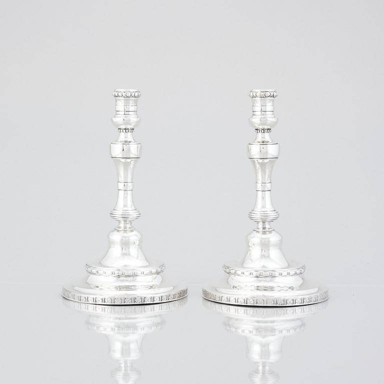 A pair of Swedish Rococo silver candlesticks, mark of Pehr Zethelius, Stockholm 1775.