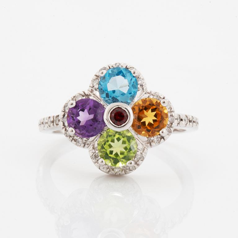 Ring, med fasettslipad topas, ametist, peridot, citrin och briljantslipade diamanter i form av blomma.