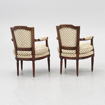 A Pair of Louis XVI Style Armchairs, 20th Century.