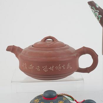 A collection of Yixing tea pots and tea cups, China, second half of the 20th century.