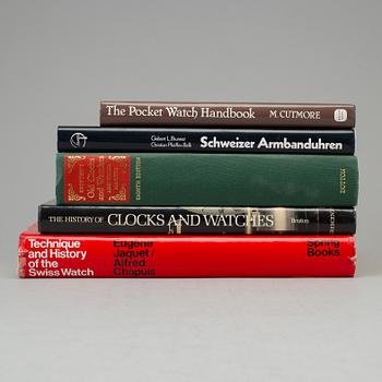 A set of 5 watch books.