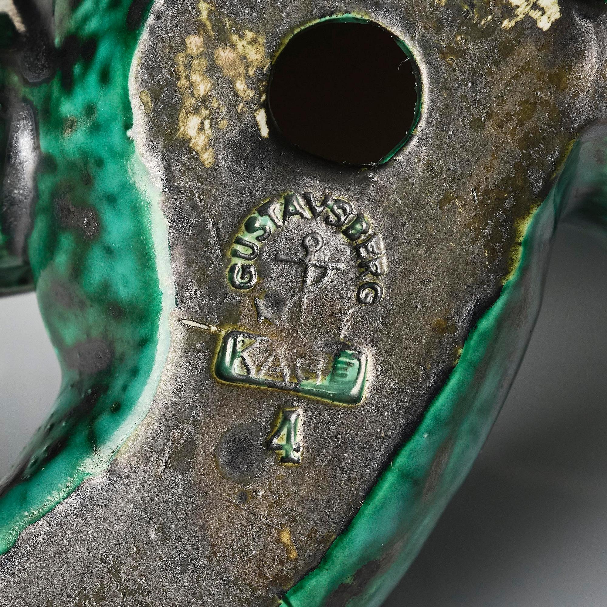Wilhelm Kåge, an "Argenta" stoneware sculpture of a dragon puppy, Gustavsberg, 1940s.