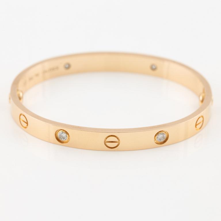 Cartier armband "Love" 18K roséguld med fyra runda briljantslipade diamanter.