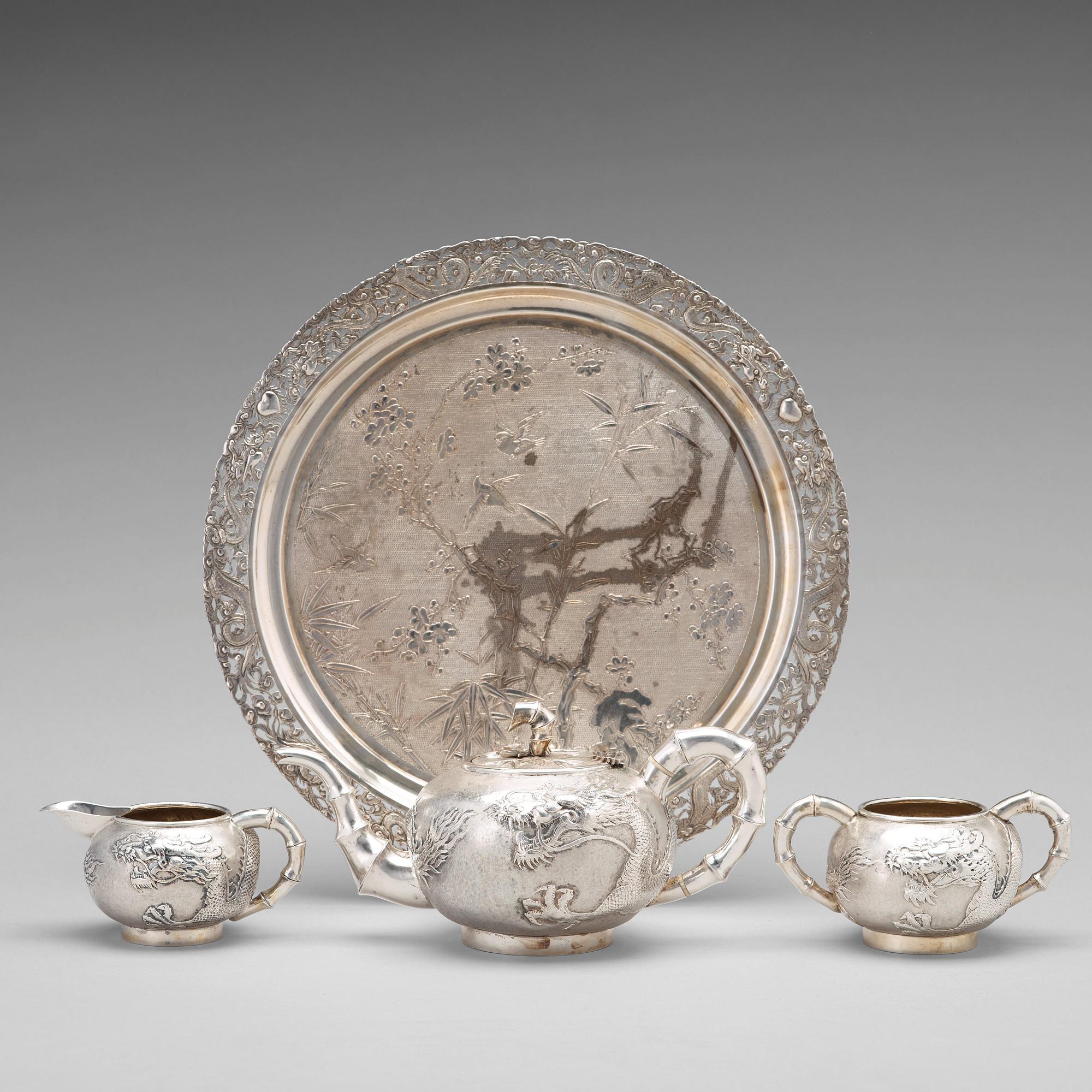A Chinese four piece silver tea set, Luen Wo, Shanghai, 1875-1925.