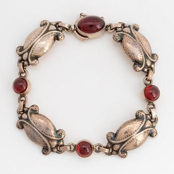 GEORG JENSEN, sterling silver and garnet bracelet.