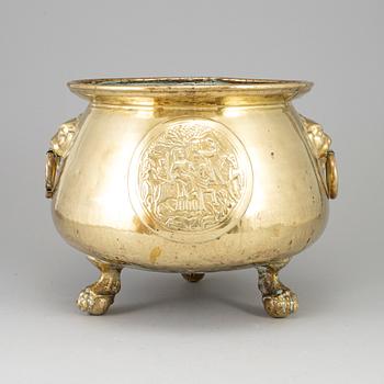 A 19th century brass flower pot.