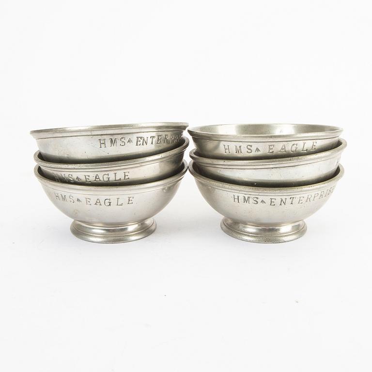 A set of five pewter tankards and six bowls England 20th century.