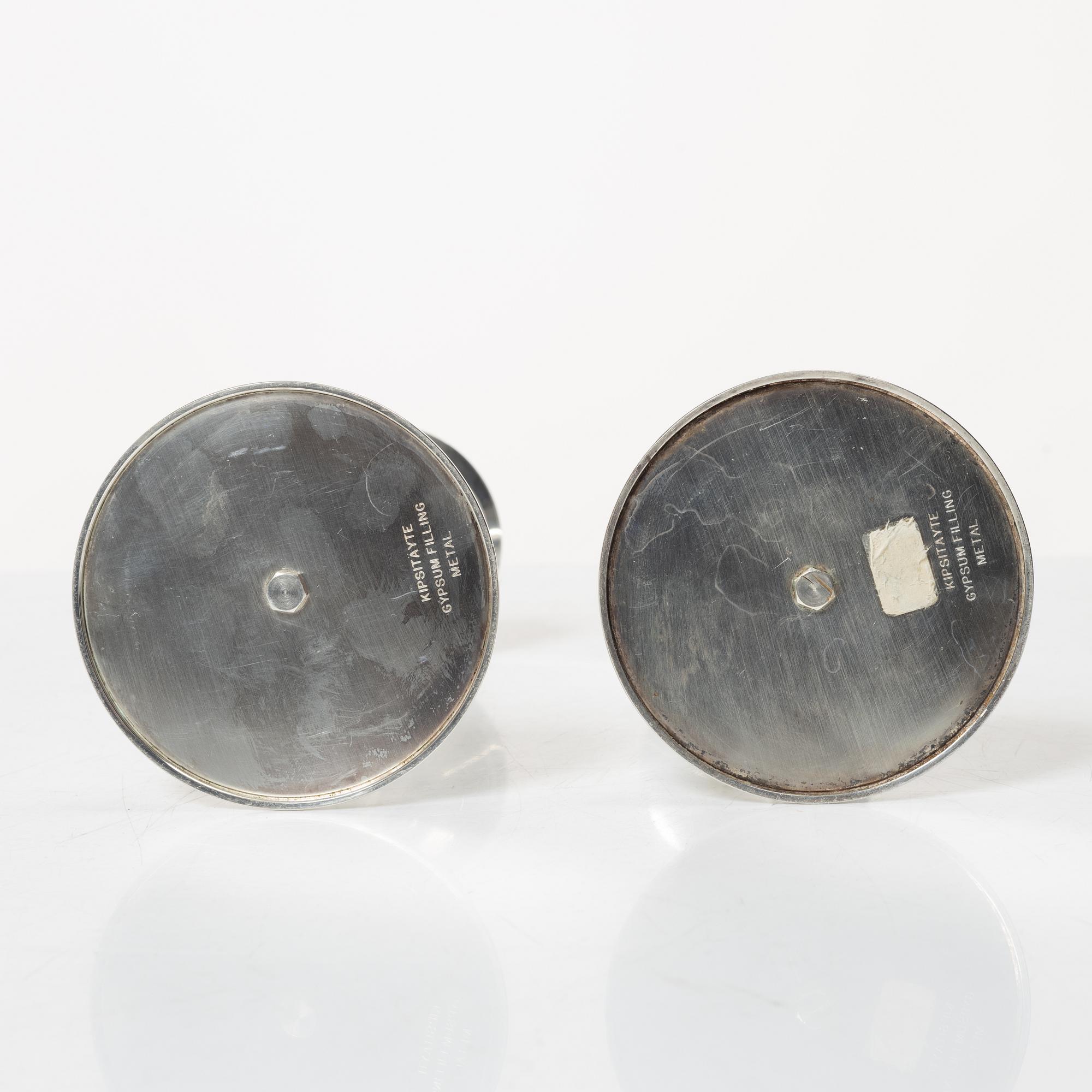 A pair of silver 'Trumpet' candlesticks, marks of Tapio Wirkkala, Kultakeskus, Hämeenlinna 1989 and 1992.