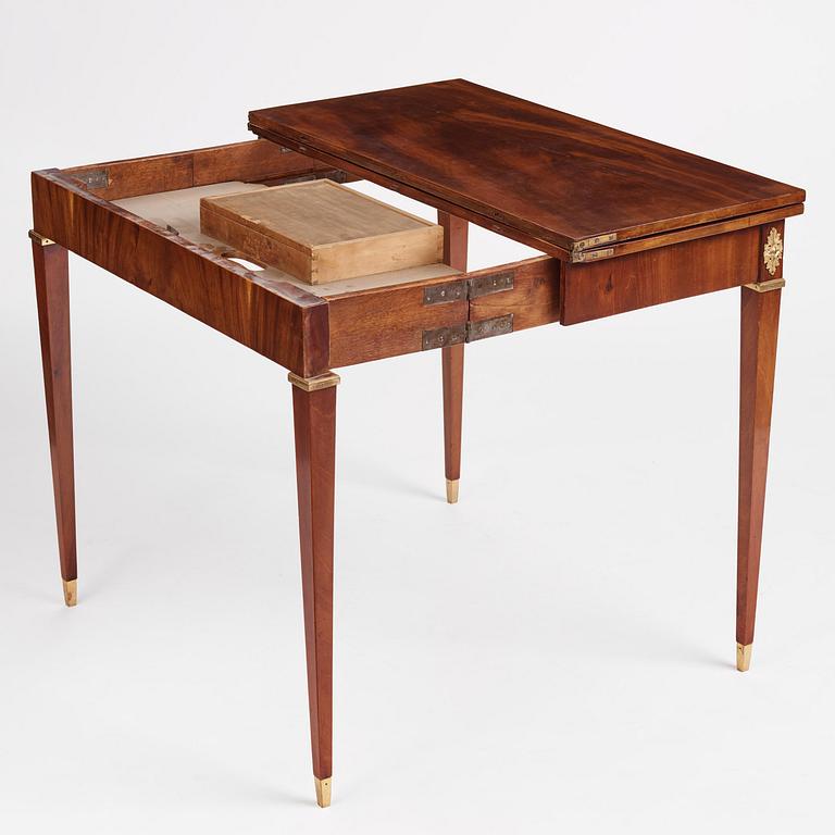 A Gustavian mahogany games table by Georg Haupt (master in Stockholm 1770-84).