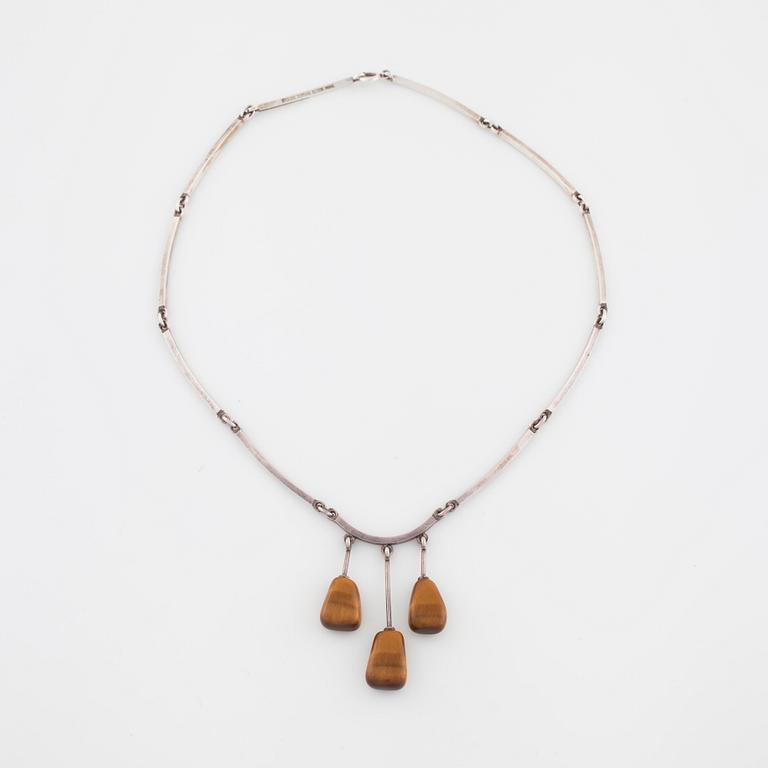 NIELS ERIK FROM, Nakskov, Danmark, a tiger's-eye quartz necklace.