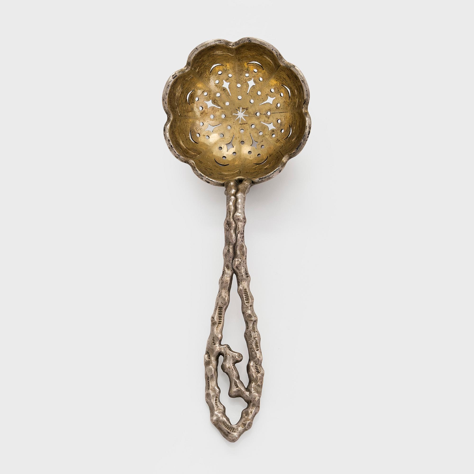 Grachev, a parcel-gilt silver sprinkle spoon, Saint Petersburg, around 1891.