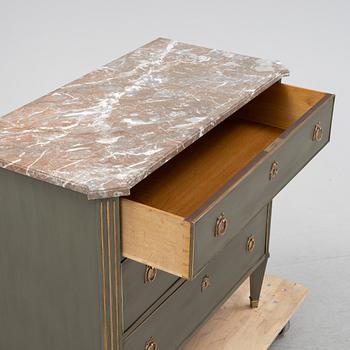 A late gustavian style chest of drawers, first half of the 20th Century.