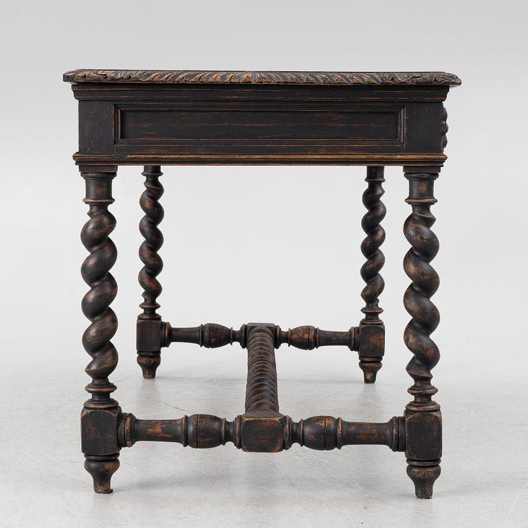 A Baroque style desk, circa 1900.