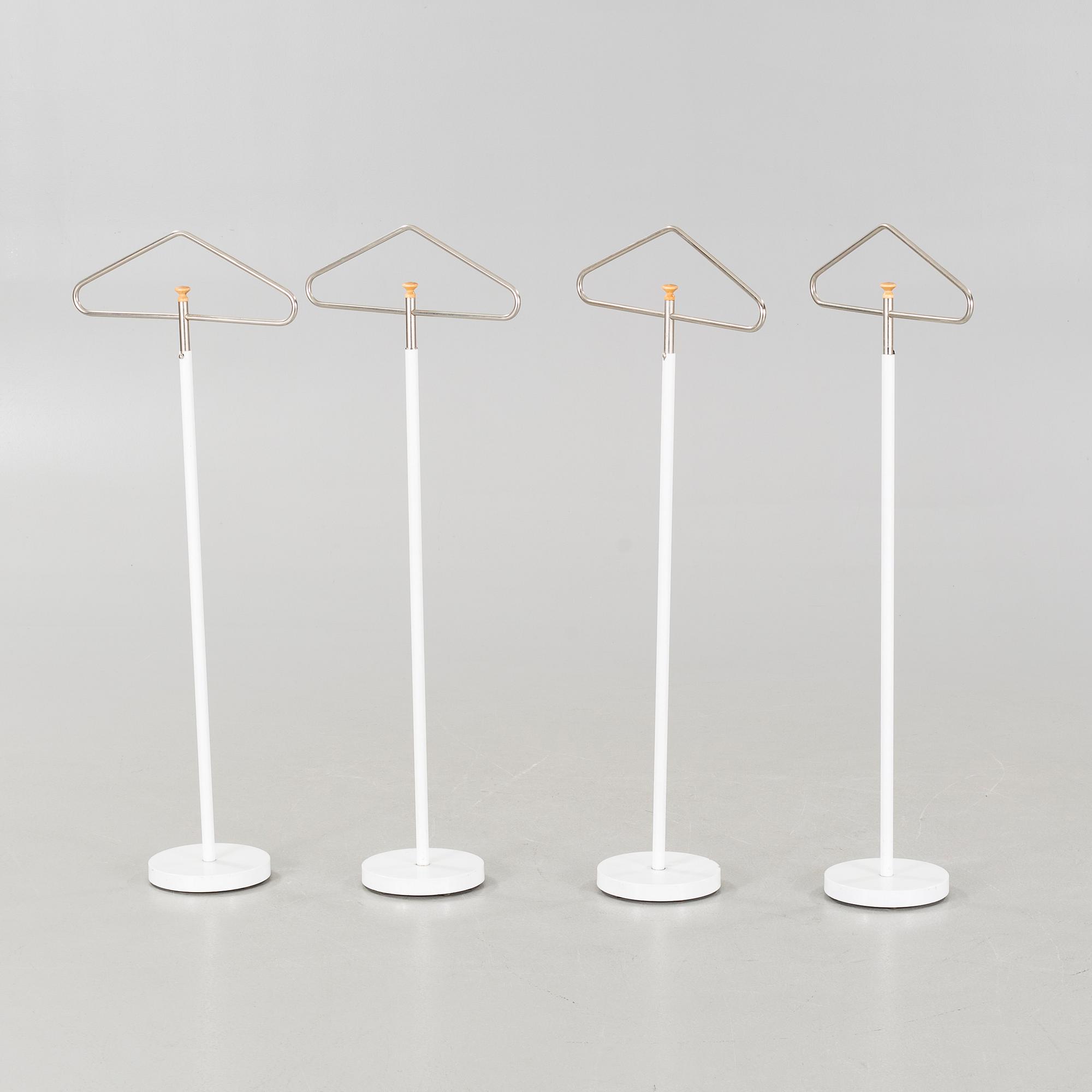 Four coat-hangers from the second half of the 20th century.