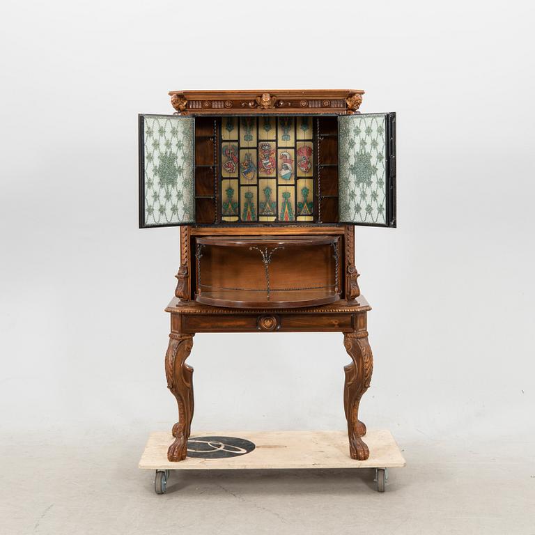 A Baroque style bar cabinet mid 20th Century.