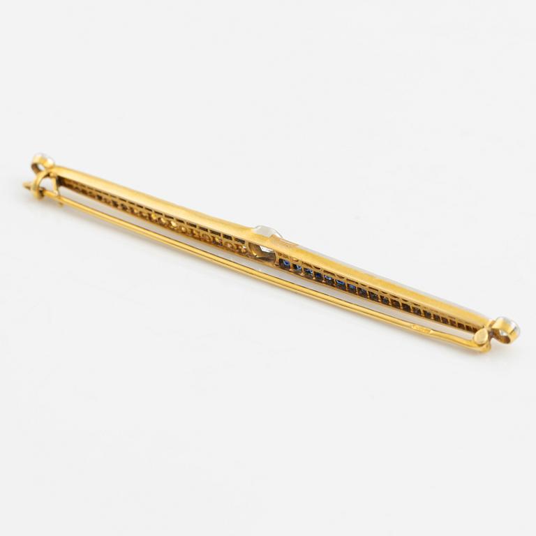 Brosch, gold with old-cut diamonds and princess-cut sapphires.