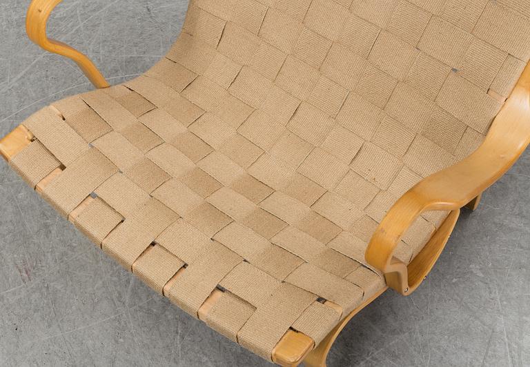 A 'Pernilla' easy chair by Bruno Mathsson for Dux.