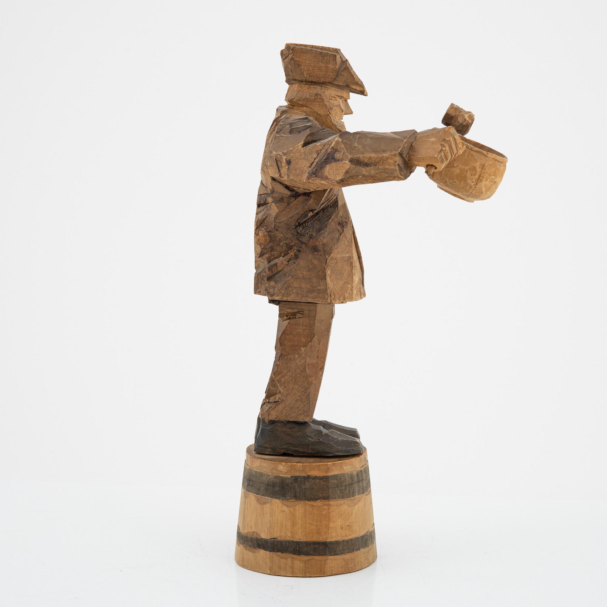 Axel Petersson Döderhultarn, skulptur, signerad. Delvis bemålat trä, höjd 34 cm.