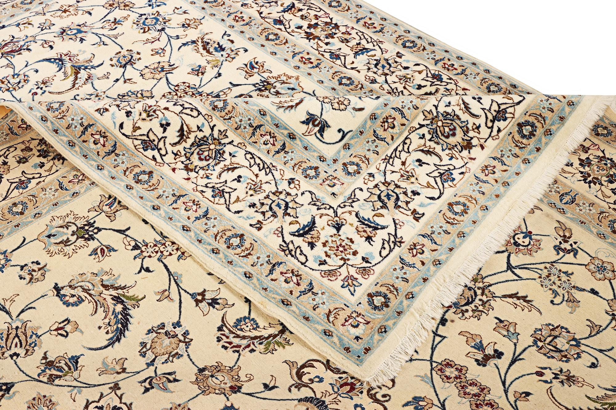 A part silk Nain carpet, 9 LA, a. 398 x 289 cm.