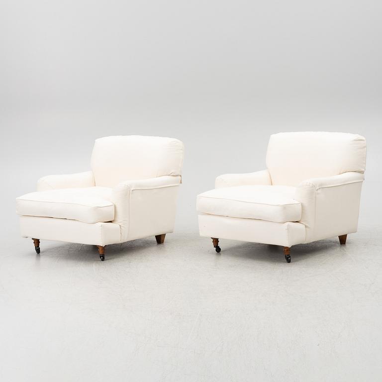 Vico Magistretti, a pair of 'Raffles' armchairs, De Padova, Italy, 21st century.