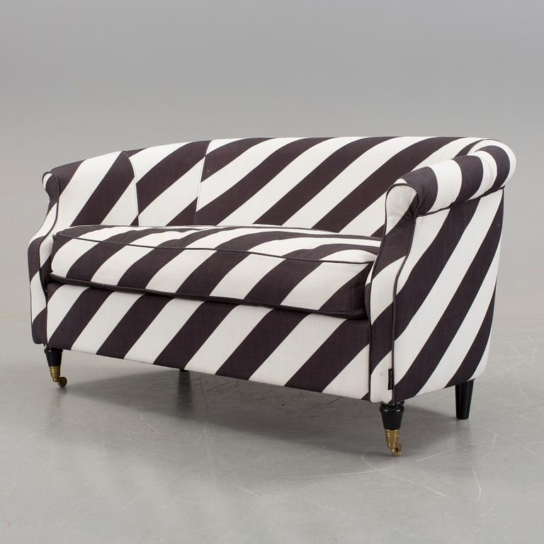 A black and white striped sofa by Rosenhof Art Factory, 21st century.