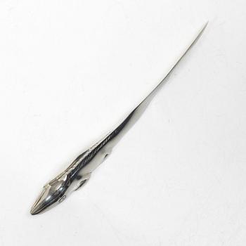 Firma Svenskt Tenn, Candelabrum, 'Vänskapsknuten', and paper knife, 'Alligator'.