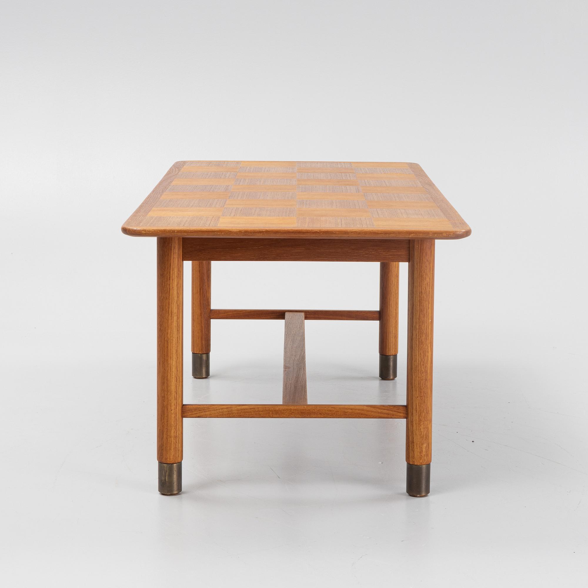 A Teak Veneer Coffee Table, mid 20th century.