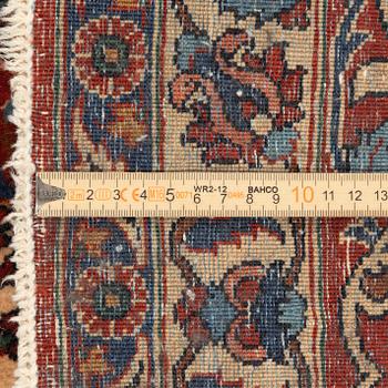 A semi-antique Isfahan rug, central Persia, c. 305 x 205 cm.