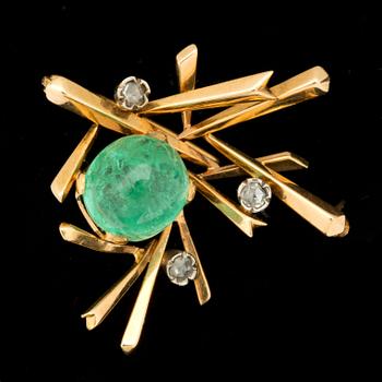 A cabochon-cut emerald and rose-cut diamond brooch. Design by Barbro Littmarck for W.A Bolin.