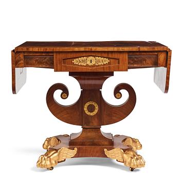 41. A Swedish Empire mahogany center table by Johan Öman, (Stockhom 1815-1833).