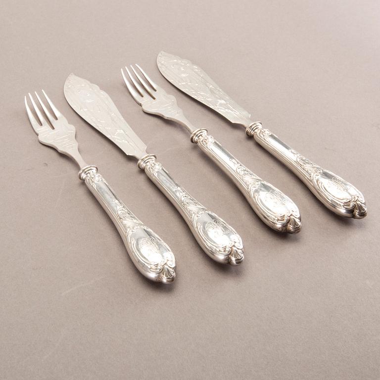 A German 20th century set of 12 fish cutlery low grade silver mark of F W Hespe hamburg early 1900s.