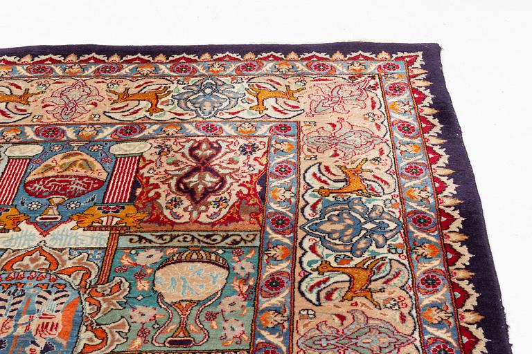 An Otiental carpet, c. 375 x 300 cm.