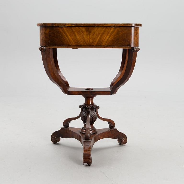 A sewing table from the first half of the 19th century.