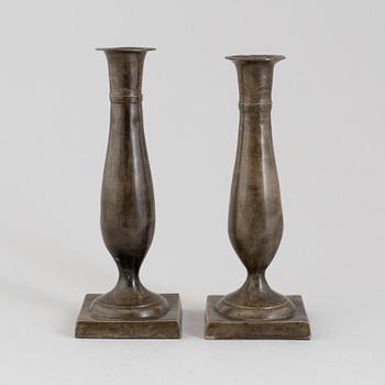 A pair of early 19th century empire pewter candlesticks.