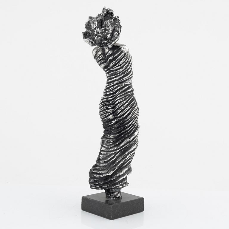 Frank Olsson, an aluminum sculpture, signed.