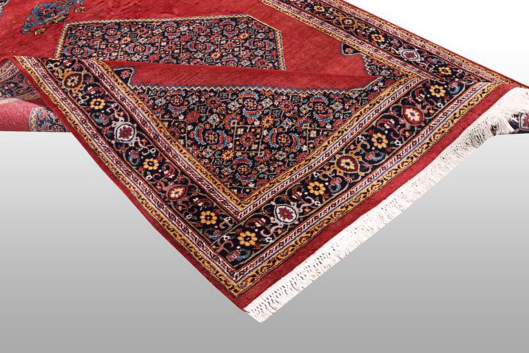 A rug, Tabriz, ca 241 x 167 cm.