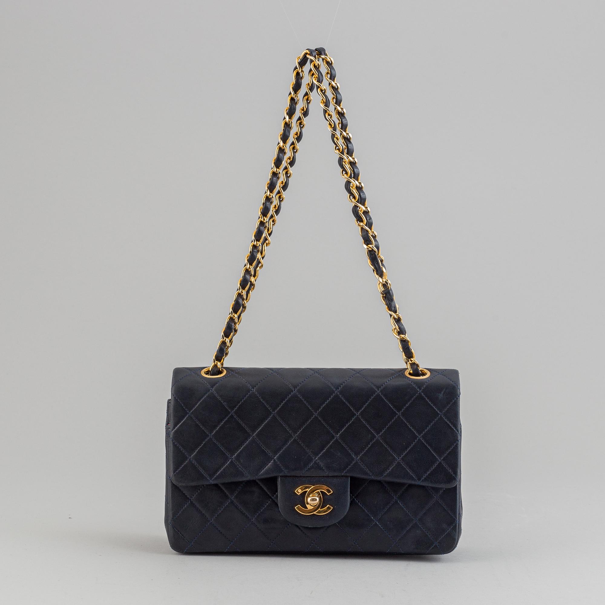 Chanel, a navy leather 'Double Flap Bag', 1989-91.
