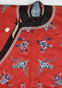 An embroidered silk robe, early 20th Century.