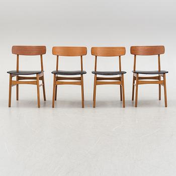 A set of four teak veneered chairs, 1950's.