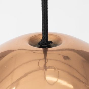 Tom Dixon, a 'Bell' ceiling lamp.