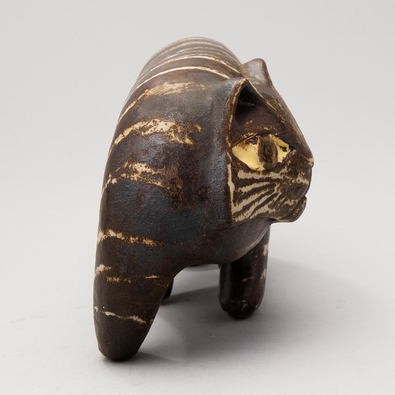 A Ceramic Figurine, signed T Kaasinen Arabia Finland.