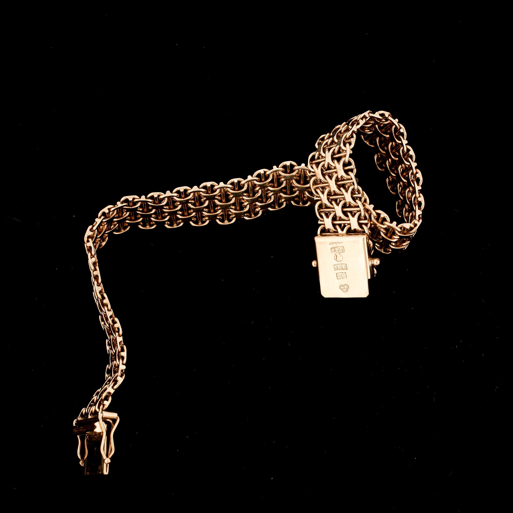 ARMBAND, guld 18k, Stockholms Stads Arbetsvårdsbyrå, Stockholm med otydlig årtalsbokstav. Vikt ca 21 gram.