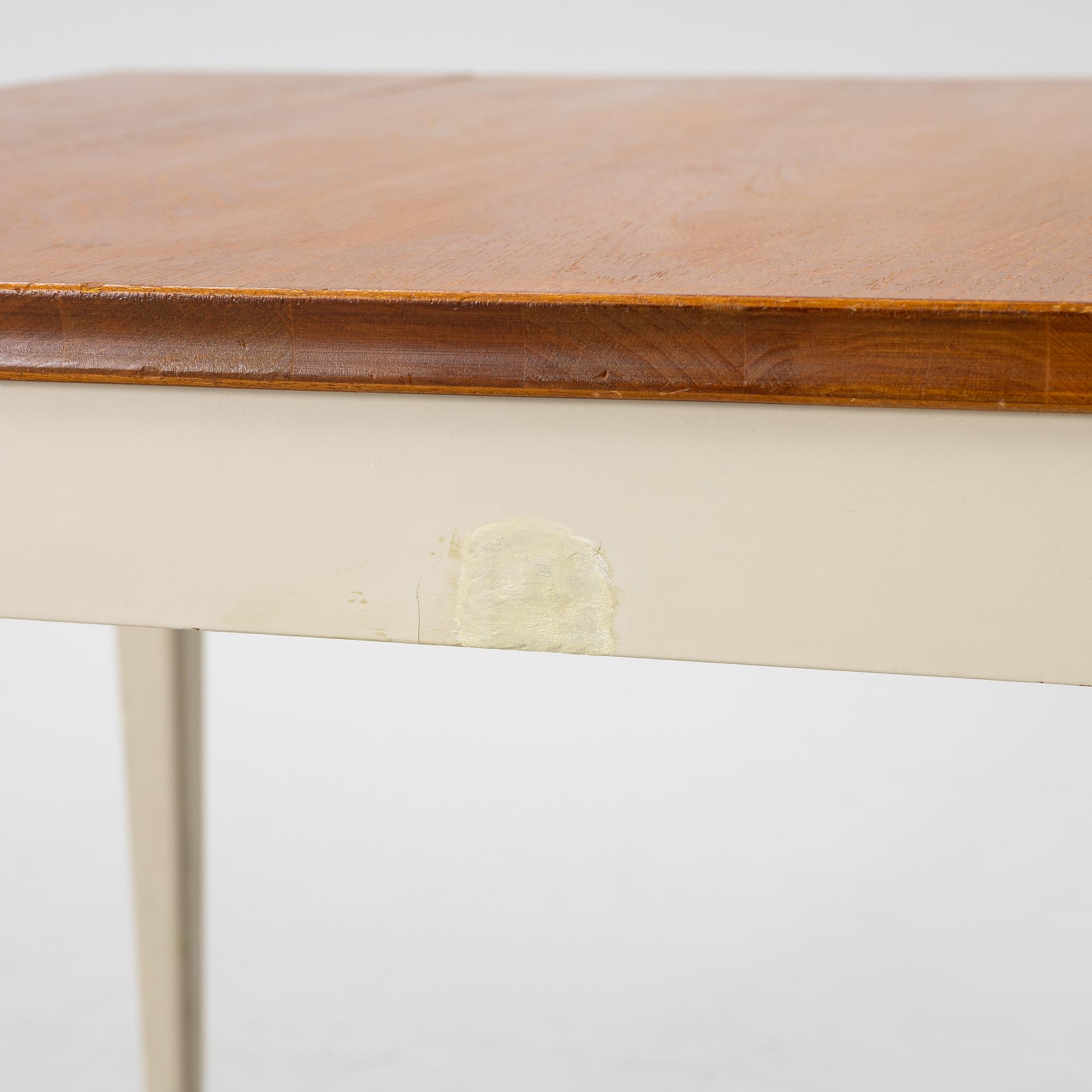 A dining table, mid-20th century.