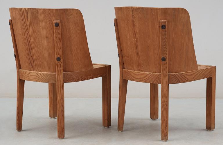 A pair of Axel Einar Hjorth stained pine 'Lovö' chairs by Nordiska Kompaniet, 1930's.