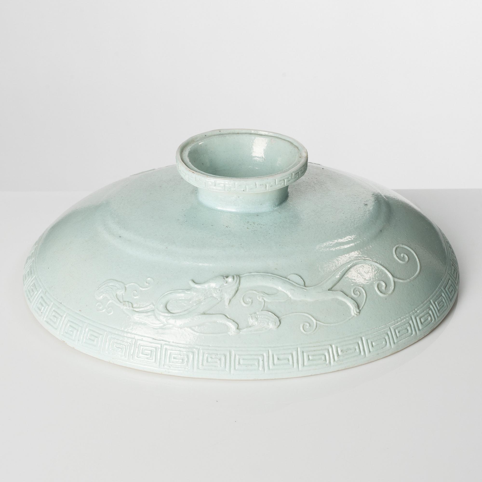 A monochrome bisquit Gui cover, Qing dynasty 18/19th Century.