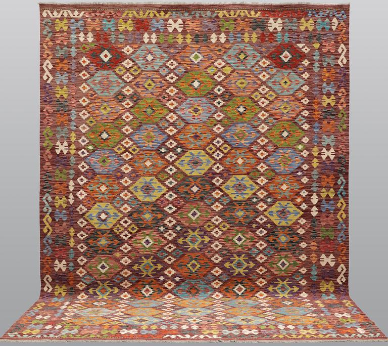 A Kilim carpet, approx. 345 x 256 cm.