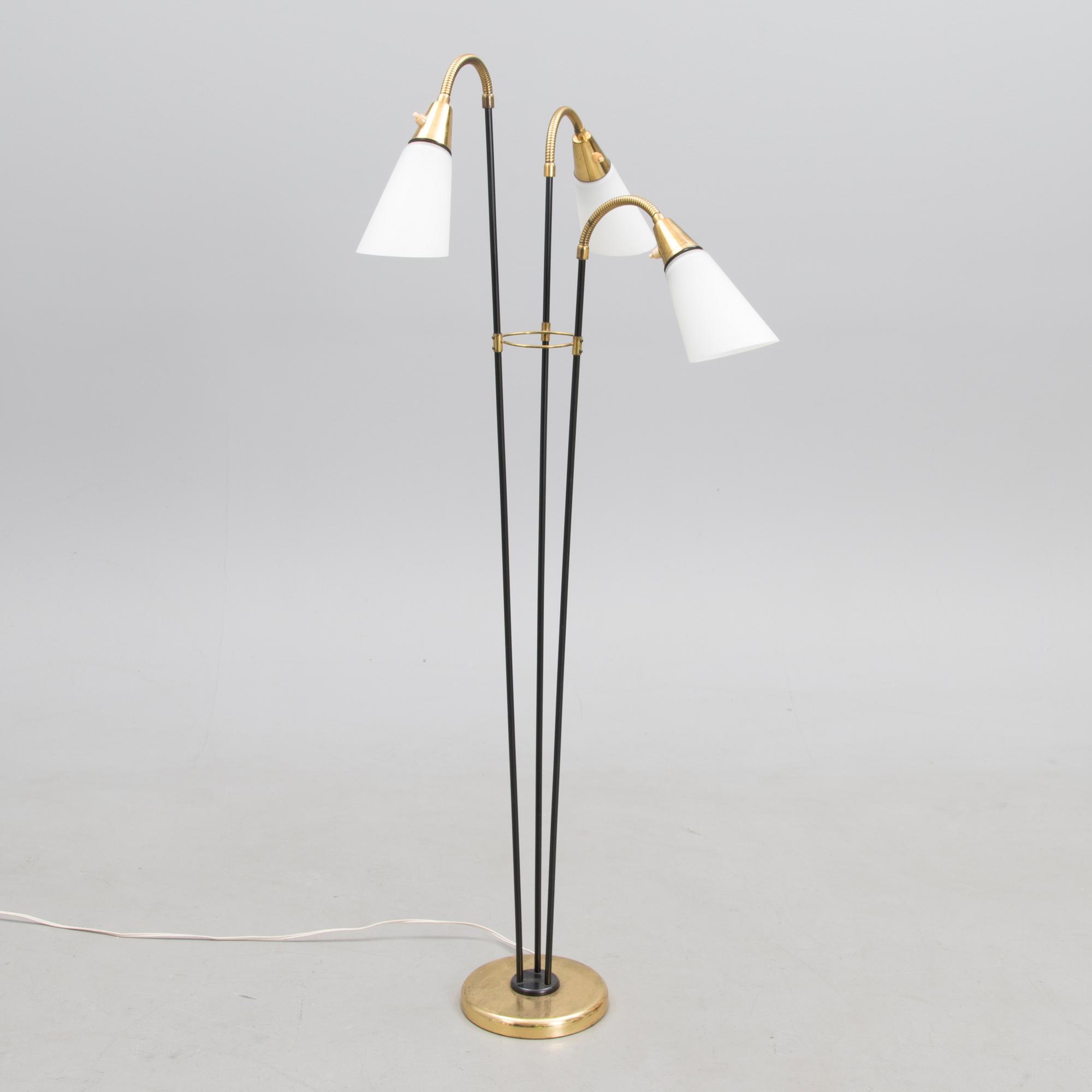 A mid 20th century floor lamp, marked AJH.7.