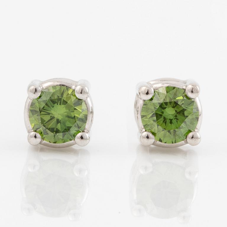 Earrings 18K white gold with colour-treated green brilliant-cut diamonds.