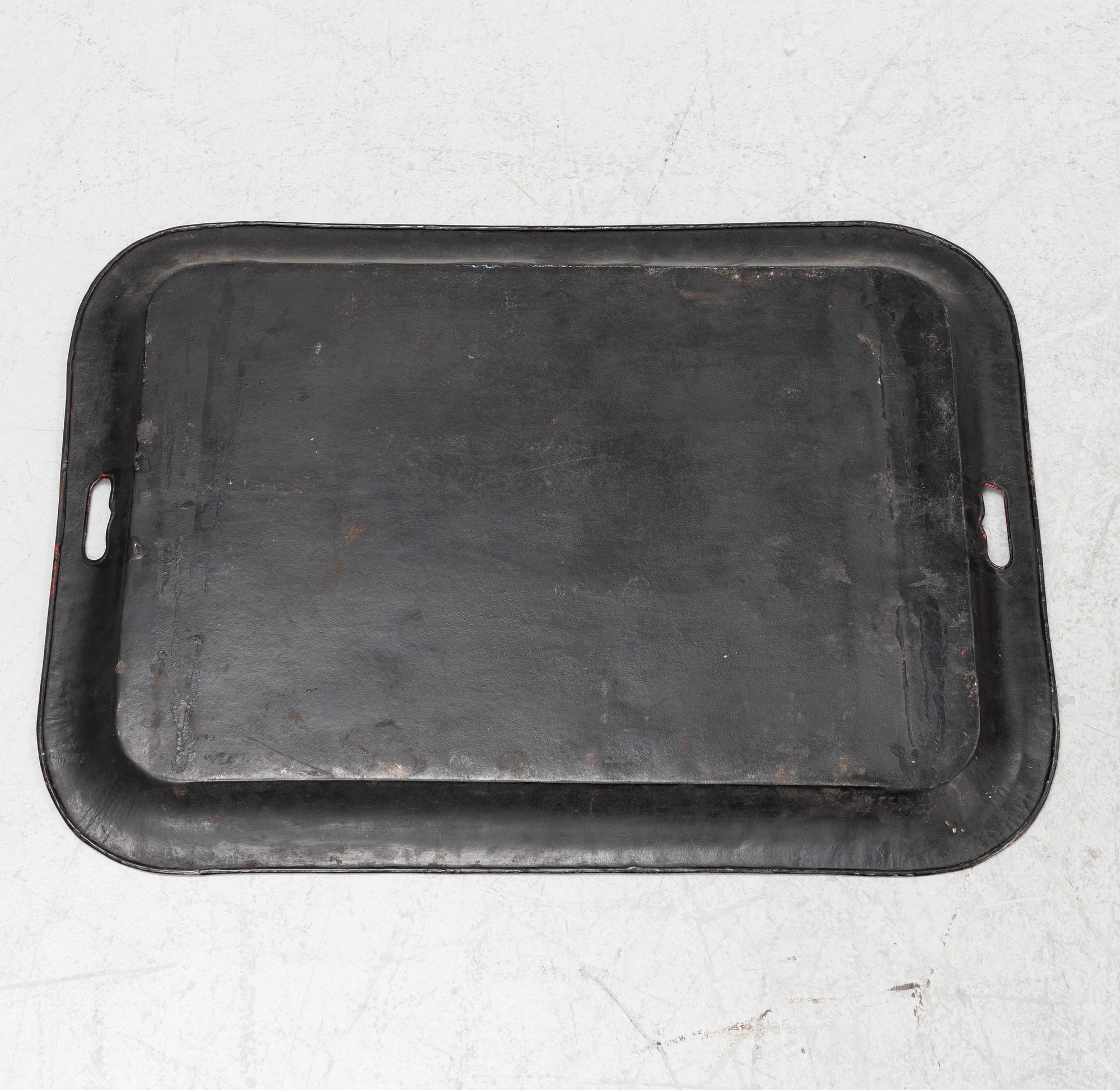 A painted 19th Century tin tray with later stand.